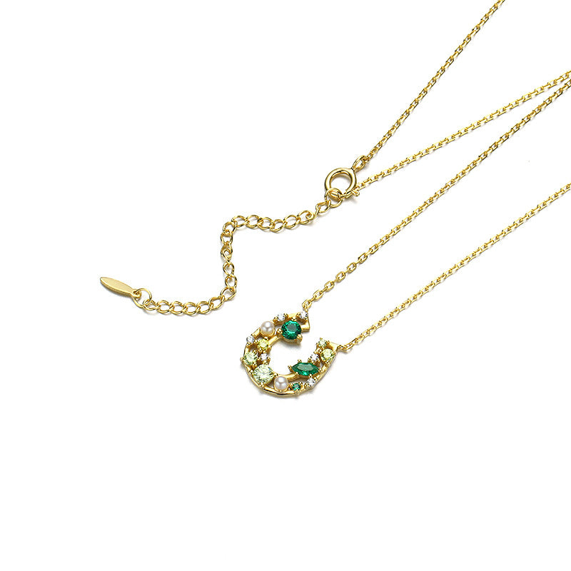 Lustrous Luck: Lucky Horseshoe Pendant Necklace with Zircon Accents